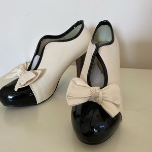White and black heels